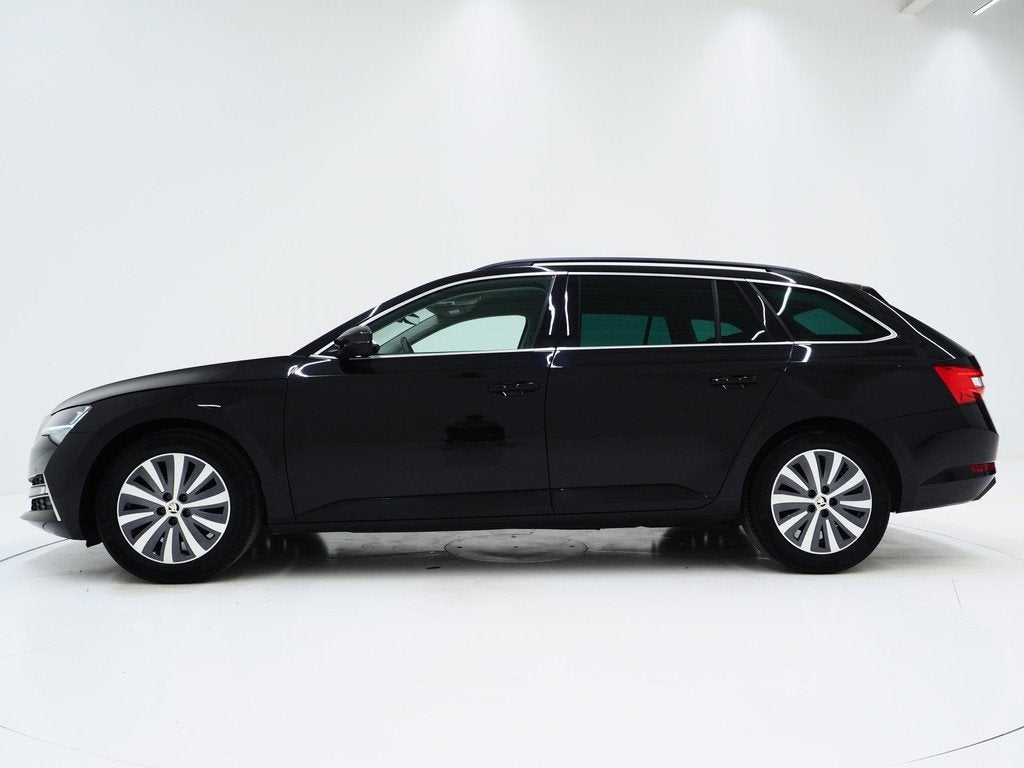 Skoda Superb Combi 1.4 TSI iV 218PK | Leder | Trekhaak | Mem, Auto's, Skoda, Gebruikt, Zwart, 4 cilinders, Zwart