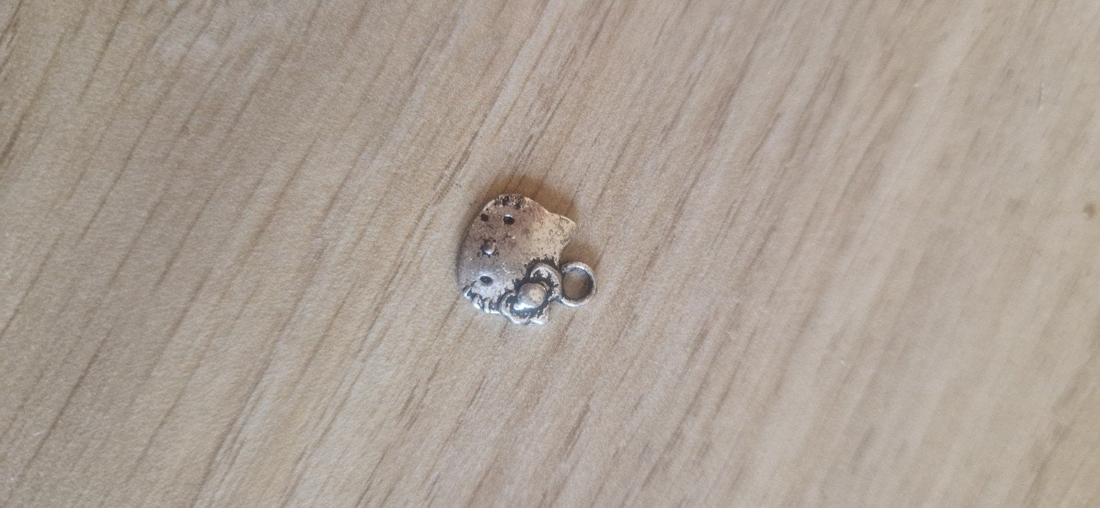 Hello Kitty bedel zilverkleurig, Overige merken, Gebruikt, Ophalen of Verzenden, 1 bedel