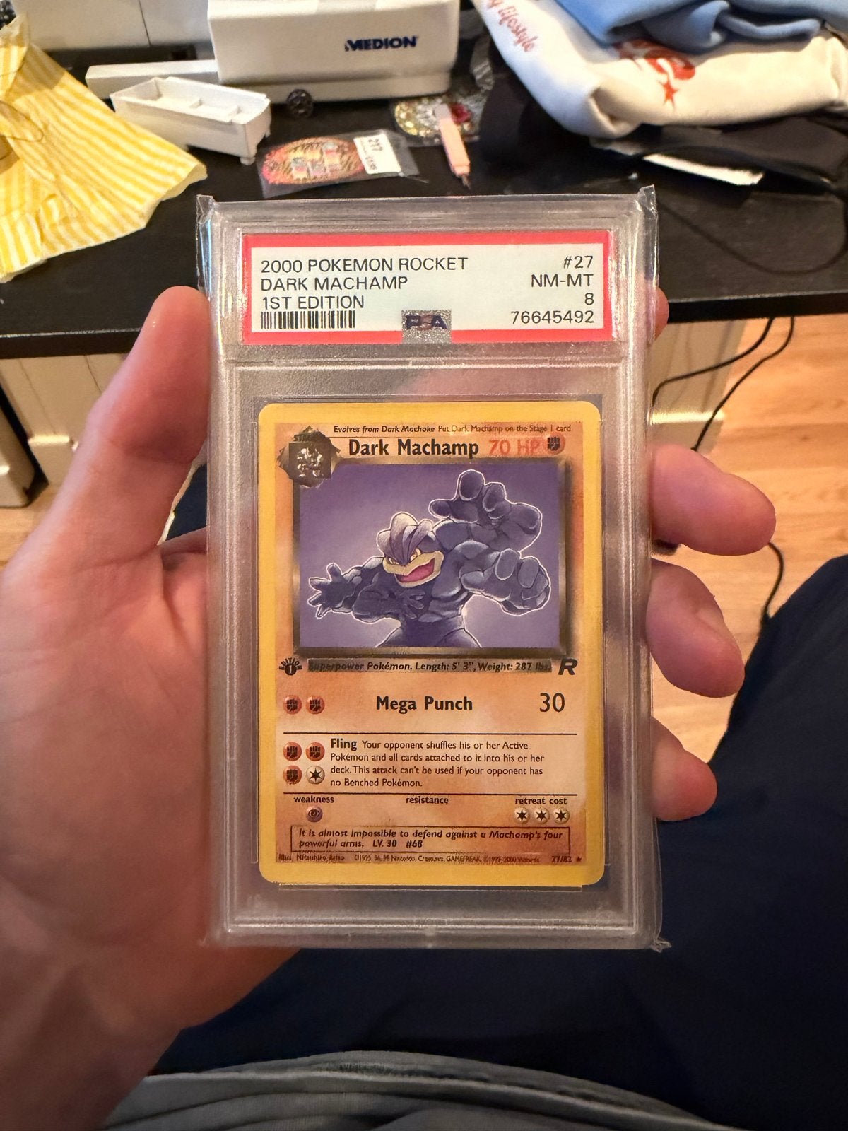 Dark Machamp PSA 8 1st Edition Pokémon Kaart, Ophalen of Verzenden, Zo goed als nieuw, Losse kaart