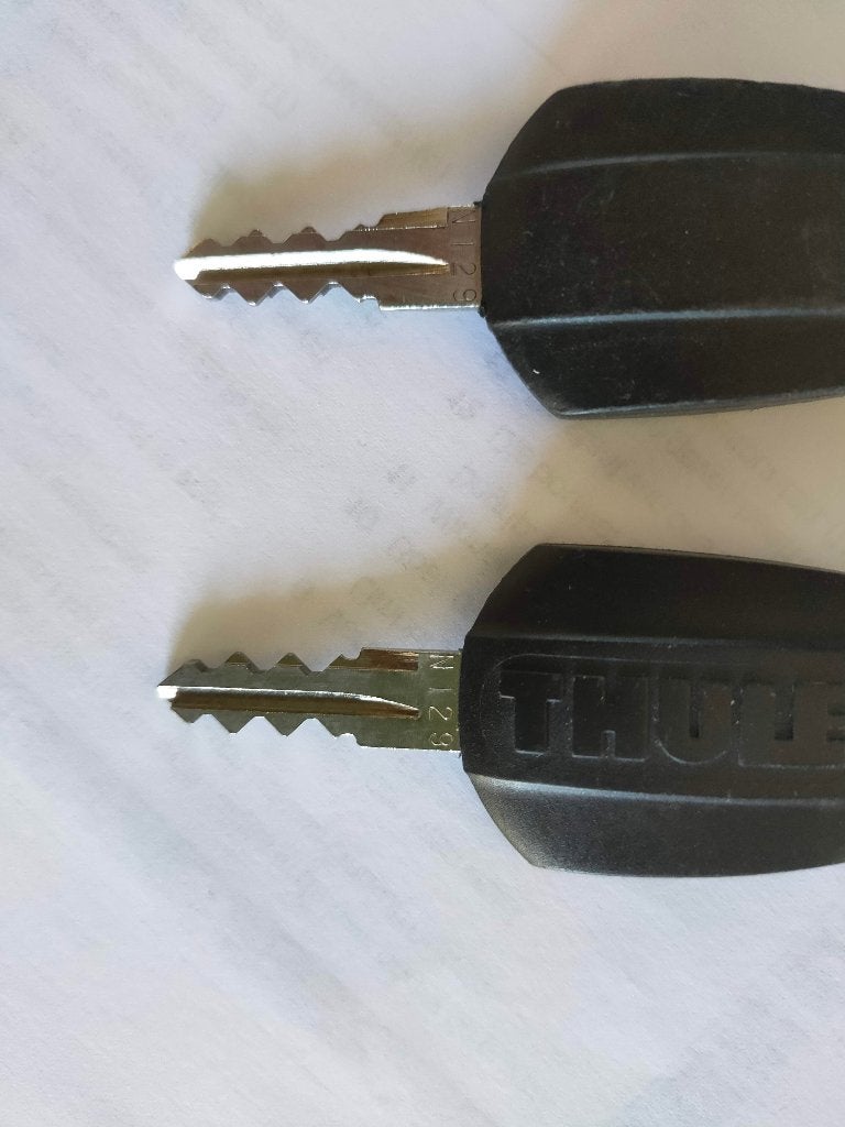 Originele Thule sleutel N129, Auto diversen, Dakdragers, Ophalen of Verzenden, Zo goed als nieuw
