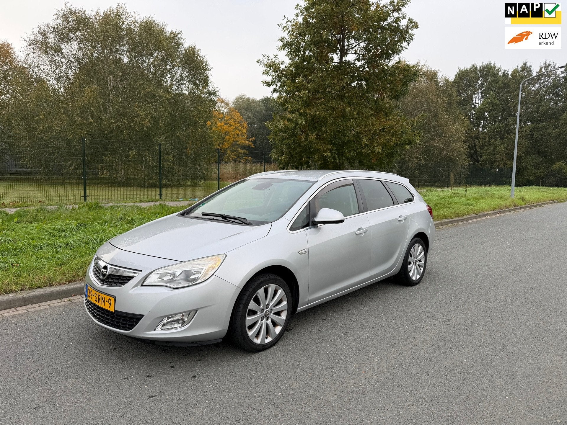 Opel Astra Sports Tourer 1.4 Turbo Cosmo, Auto's, Euro 5, 15 km/l, Gebruikt, 4 cilinders