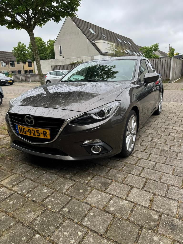 Mazda 3 2.0 Skyactiv-g 88KW HB 2015 Bruin, Auto's, Voorwielaandrijving, 1998 cc, 4 cilinders, Bruin
