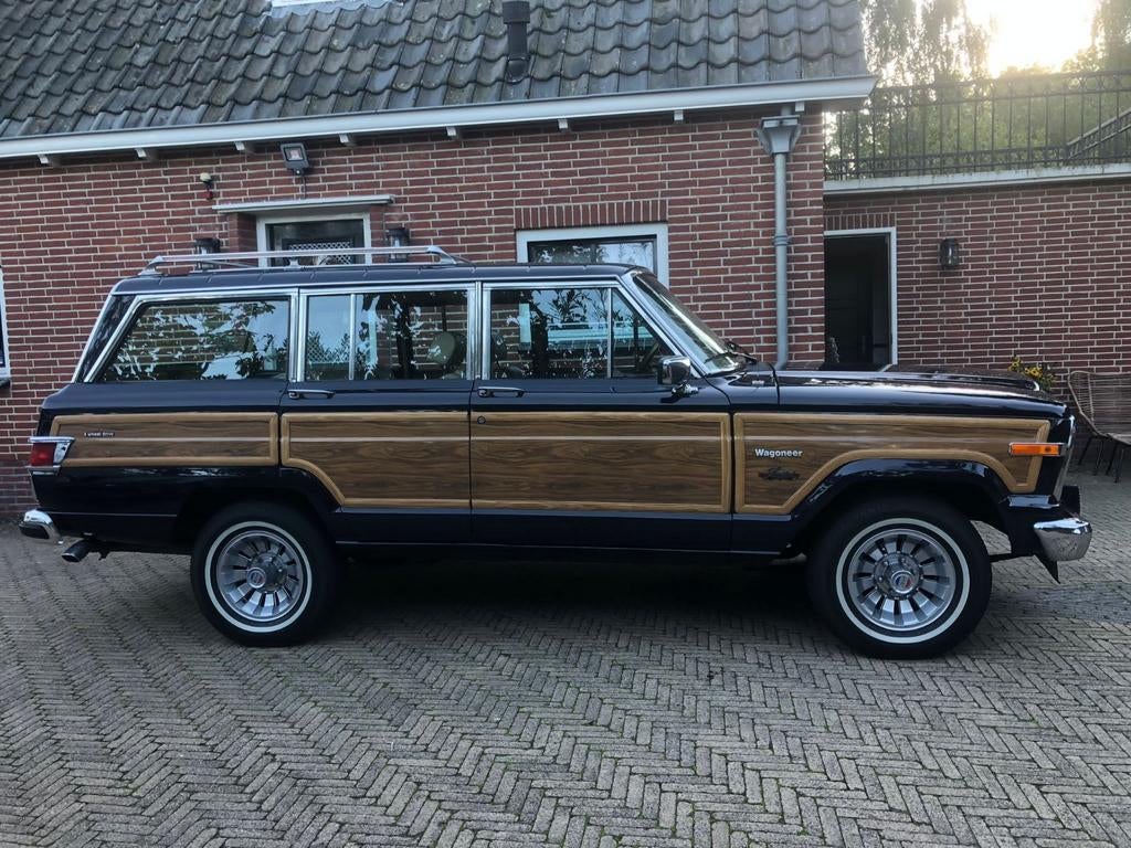 Jeep Wagoneer 5.9 AUT 4WD 1982 Blauw, Auto's, Jeep, Automaat, 145 pk, 2000 kg, Blauw