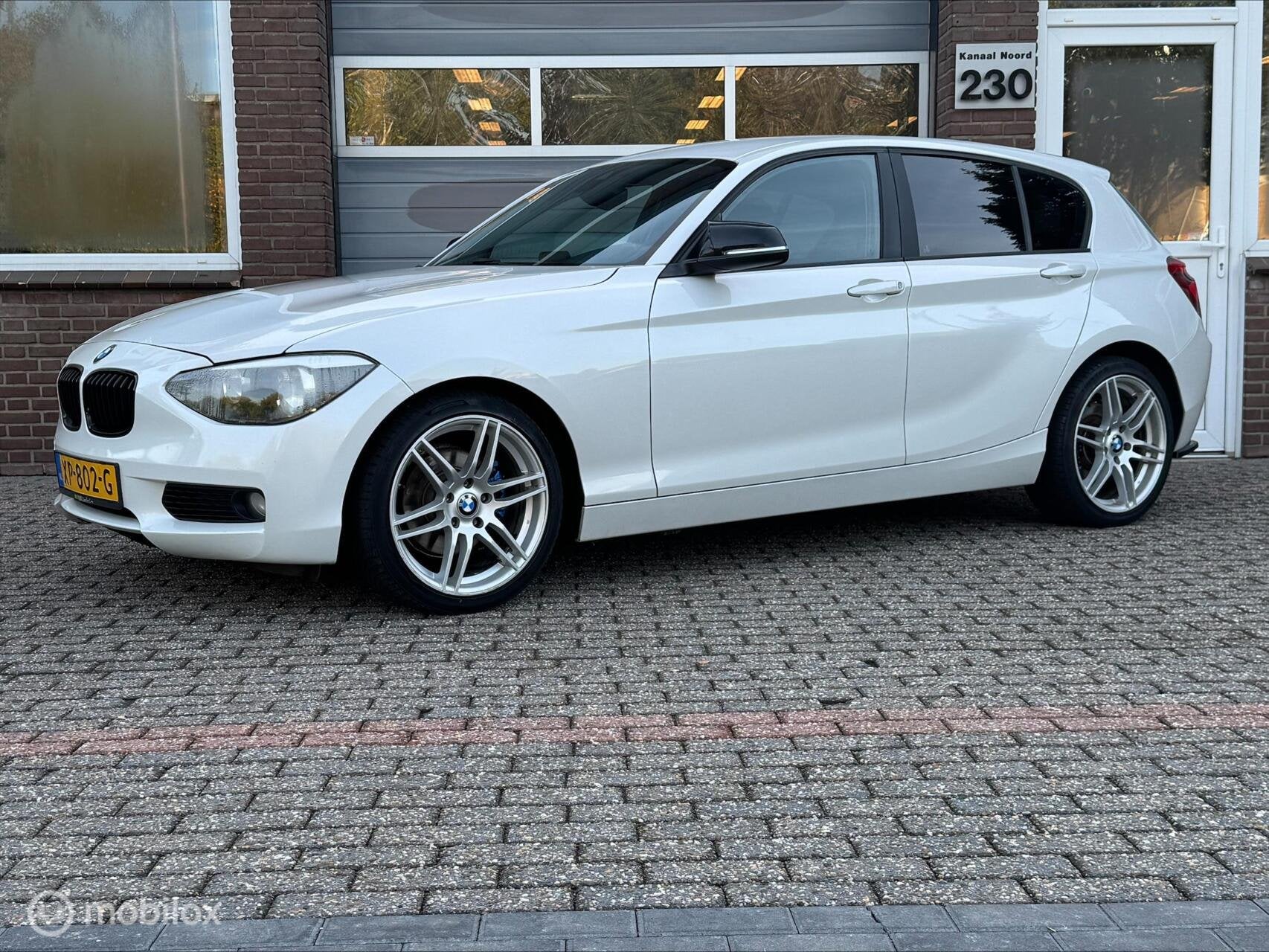 BMW 1-serie 118i Business NAVIGATIE/STOEL.VW/MISTLAMPEN, Auto's, 1-Serie, Euro 5, Achterwielaandrijving, Gebruikt