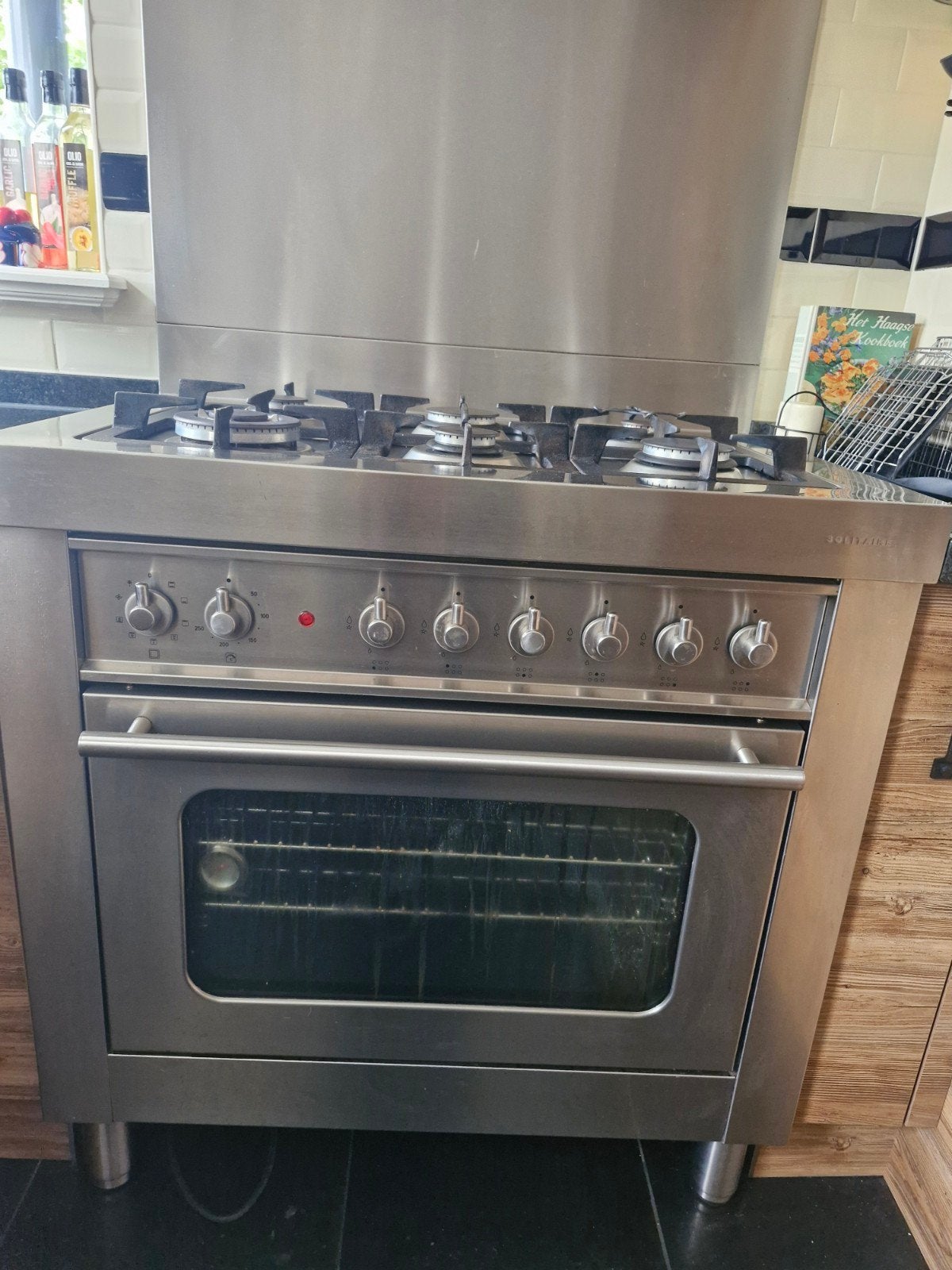 Fornuis met gasfornuis en oven - RVS, Gebruikt, Hete lucht, Ophalen of Verzenden, Gas