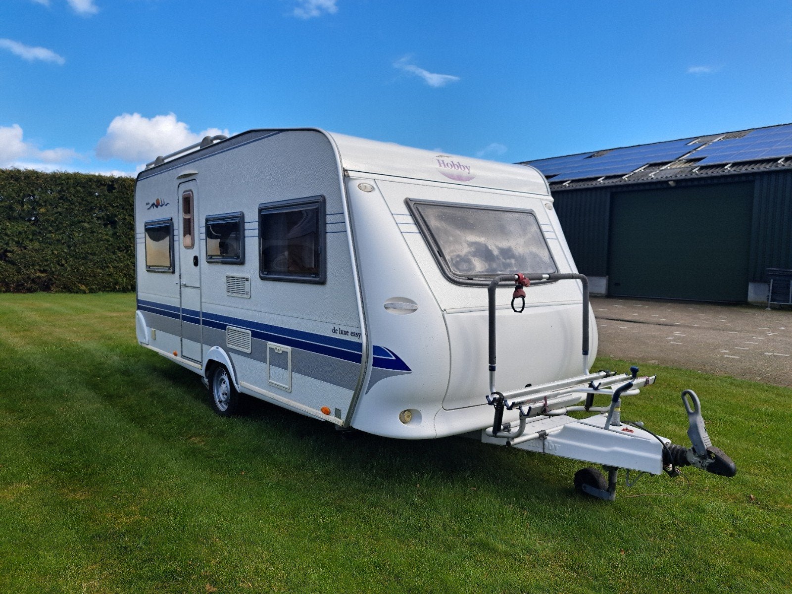 Hobby 450 Luxe Easy met inboedel + mover + fietsenrek + tent, Rondzit, Hobby, Dwarsbed, Particulier
