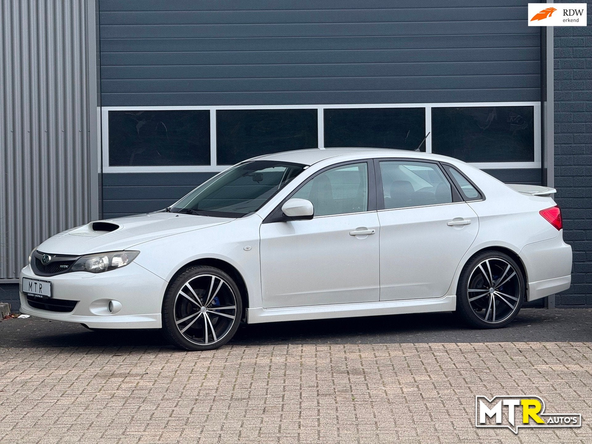 Subaru Impreza 2.5 WRX 265 PK|4WD, Auto's, Subaru, Stof, Gebruikt, Zwart, 4 cilinders
