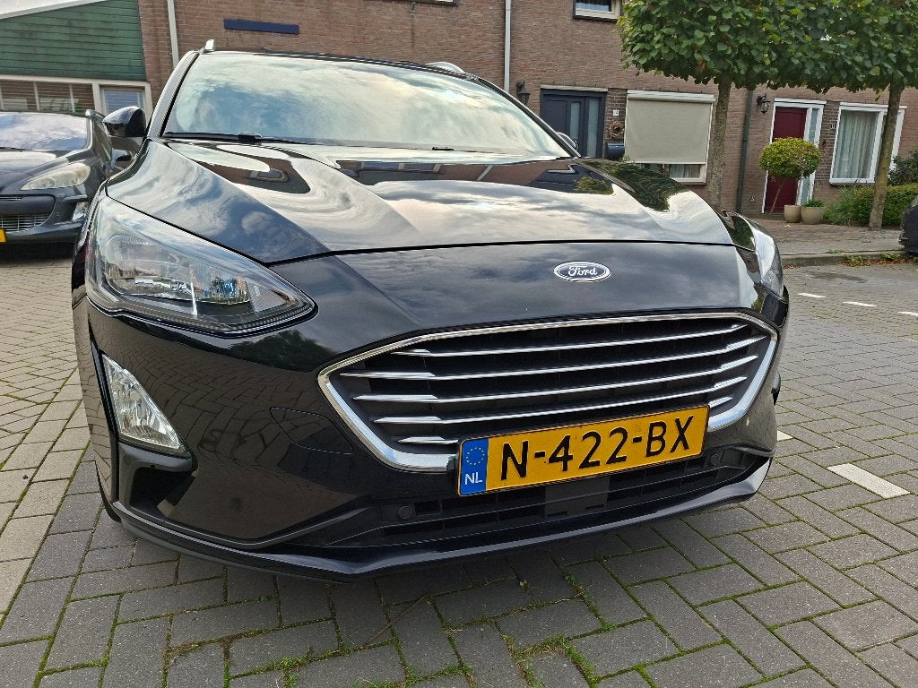 Ford Focus Wagon Tit. X Bns. 2021 Nav. Cam. Dealer ond. NL, 1328 kg, 125 pk, Leder en Stof, Zwart