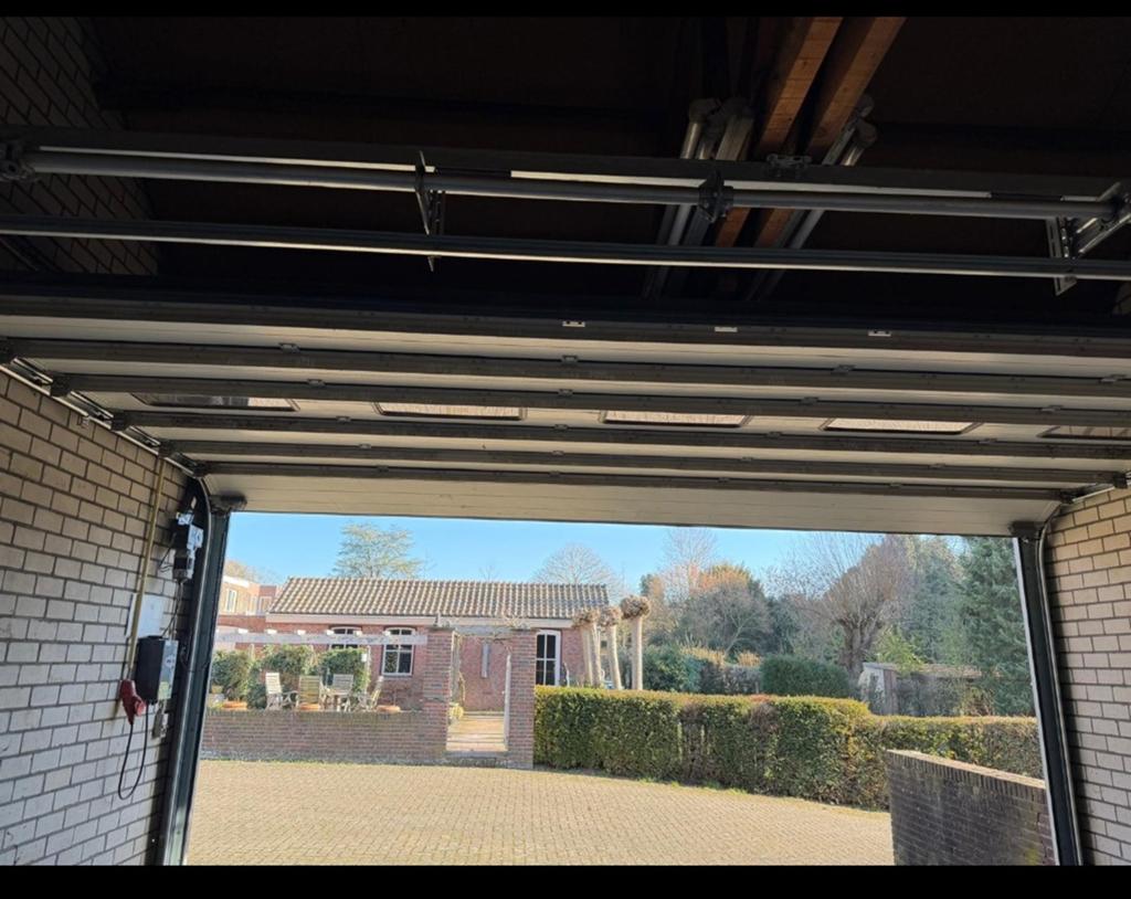 Antraciet Hörmann garagepoort, Ophalen of Verzenden
