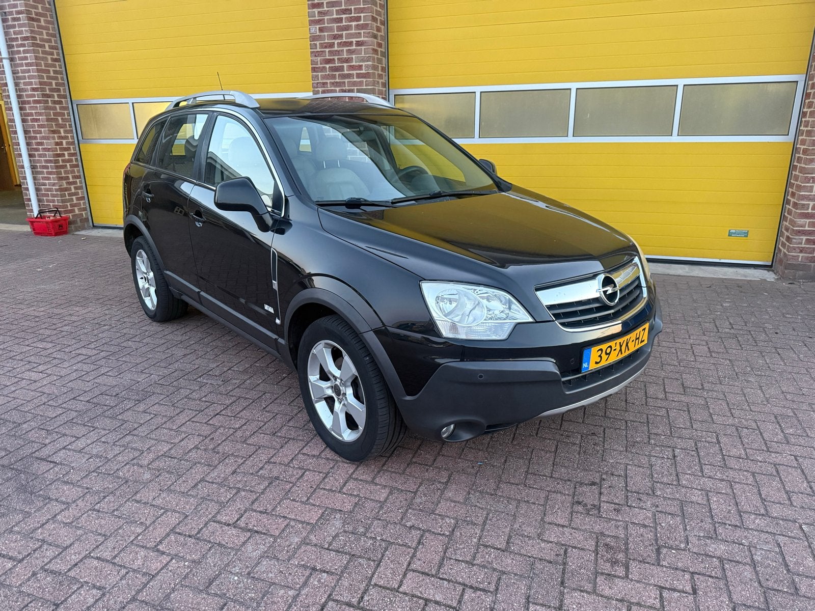 Opel Antara 2.4 16V 2007 Zwart, Auto's, Beige, 4 cilinders, Zwart, Bedrijf