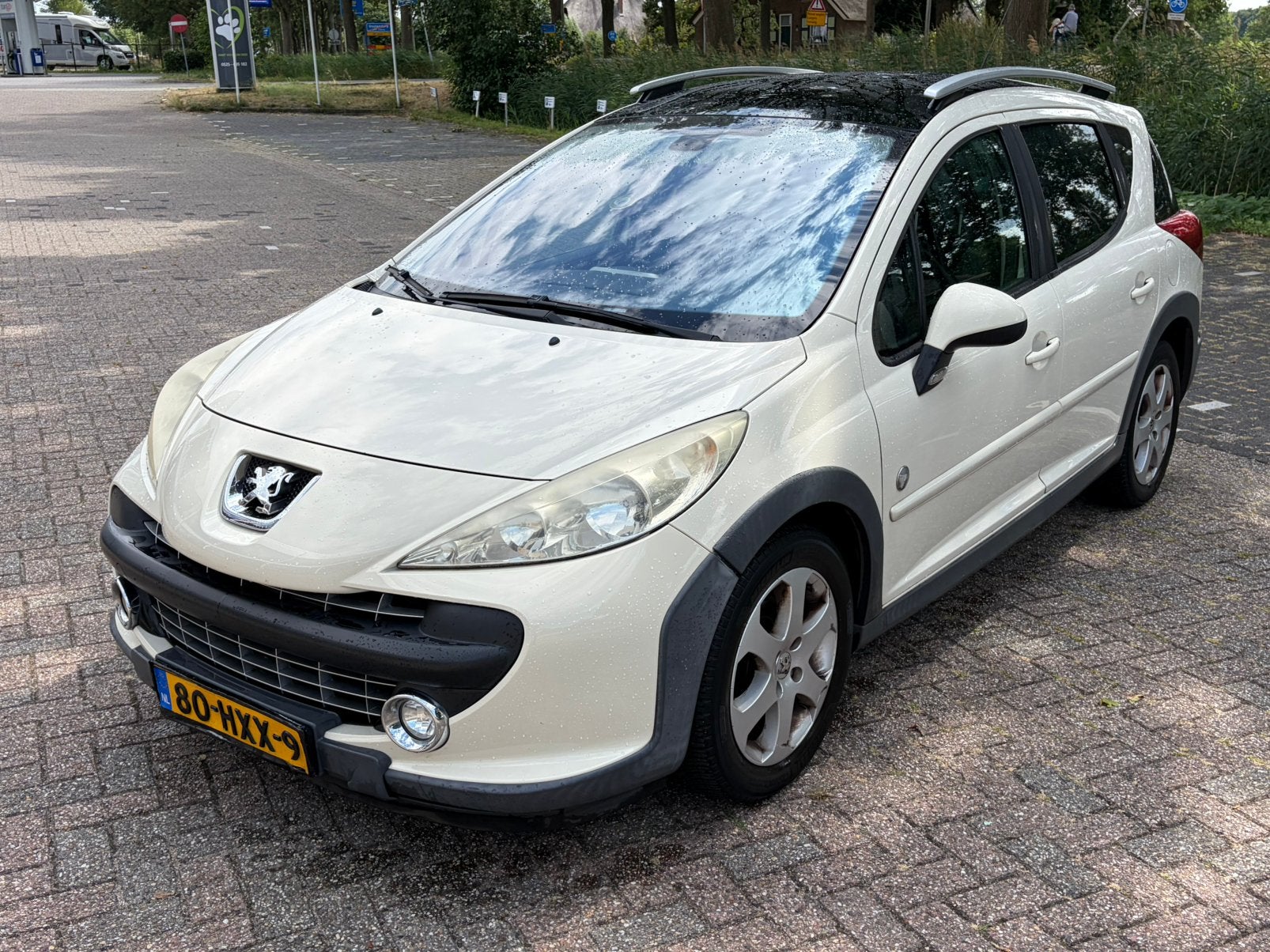 Peugeot 207 1.6 16V SW Outdoor / panodak / climate /trekhaak, Zwart, 4 cilinders, Parkeersensor, Origineel Nederlands