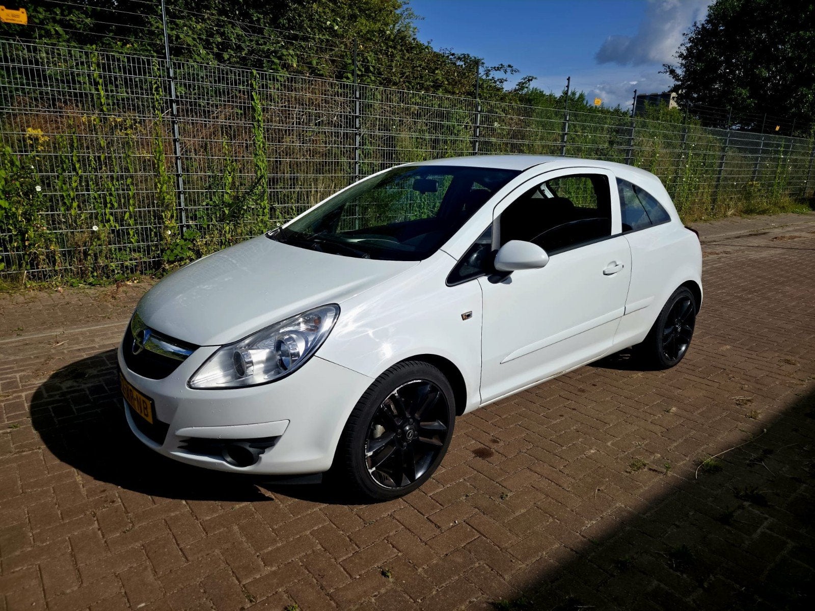Opel Corsa 1.2 16V recent nieuwe ketting, 40 €/maand, Zwart, 4 cilinders, 1229 cc