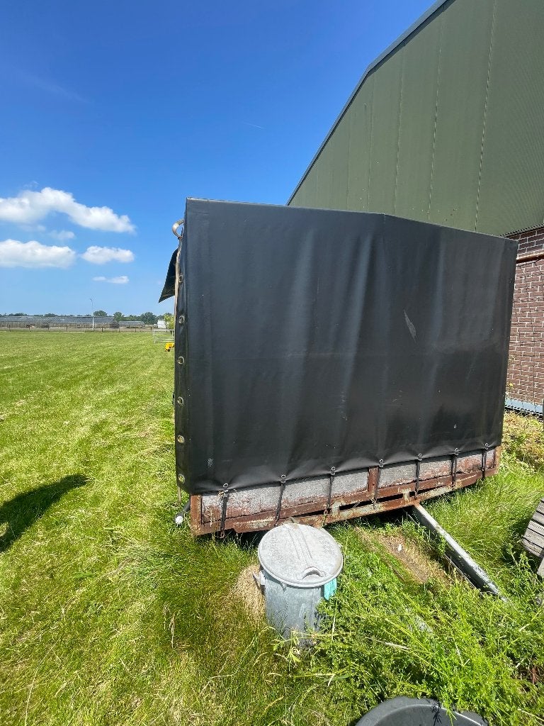 Oude aanhanger met huif, Ophalen, Gebruikt