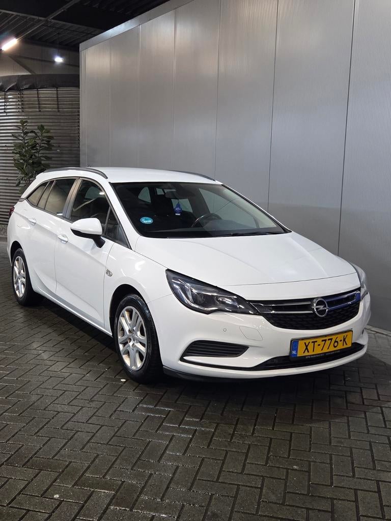 Opel Astra 1.0 Turbo 105pk Start/stop 2020 Wit, Auto's, Opel, Voorwielaandrijving, Parkeersensor, 620 kg, Wit