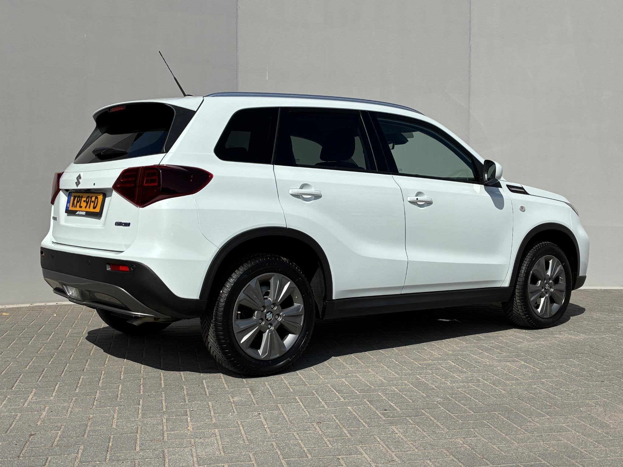 Suzuki Vitara 1.4 Boosterjet Smart Hybrid Select / 10 Jaar f, Auto's, Gebruikt, Euro 6, 4 cilinders, Wit