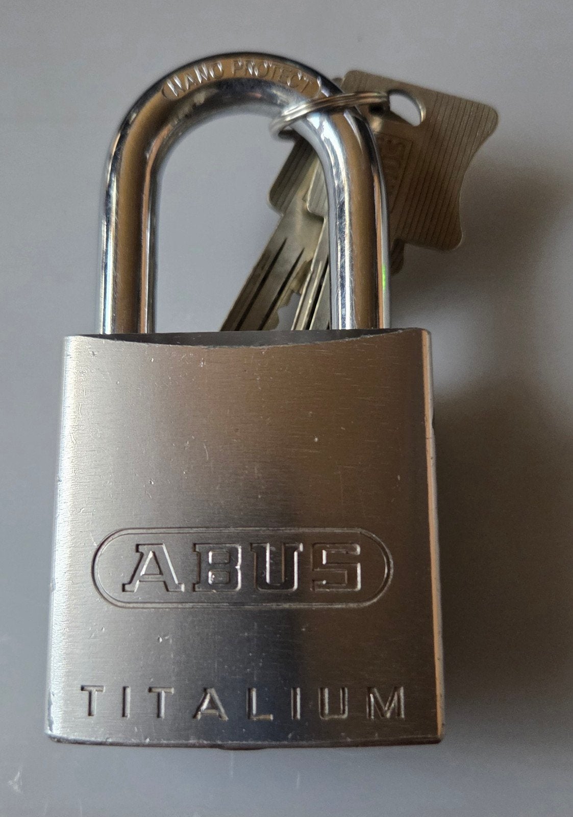 Abus Titalium 86TI/55 hangslot met Winkhaus cilinder, Ophalen of Verzenden