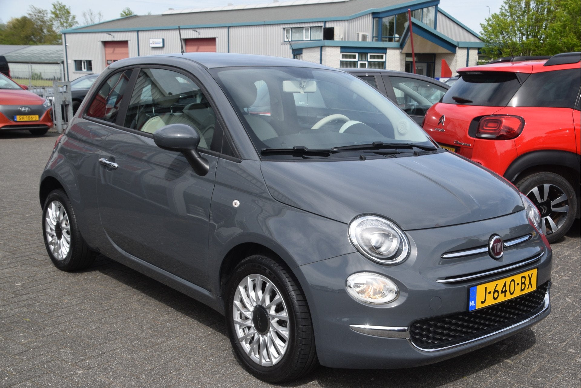 Fiat 500 1.0 Hybrid Lounge Carplay | PDC | Airco | Cruise |, Auto's, Voorwielaandrijving, Stof, Euro 6, Met garantie (alle)
