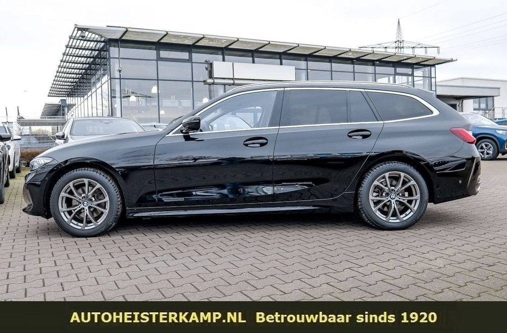 BMW 3 Serie Touring 320d 190 PK ACC Trekhaak Sportstoelen LE, Auto's, Automaat, Achterwielaandrijving, Zwart, Leder en Stof