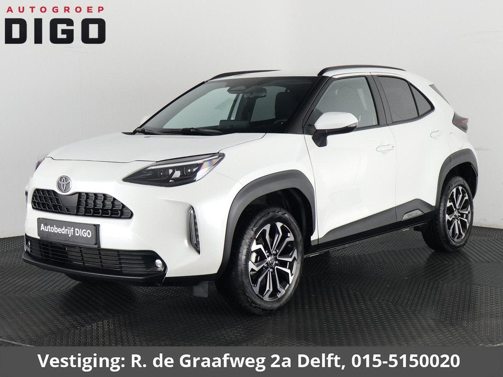 Toyota Yaris Cross 1.5 Hybrid 115 Dynamic Luxury | Stuur-& S, Auto's, Toyota, Stof, 1165 kg, Wit, 1490 cc