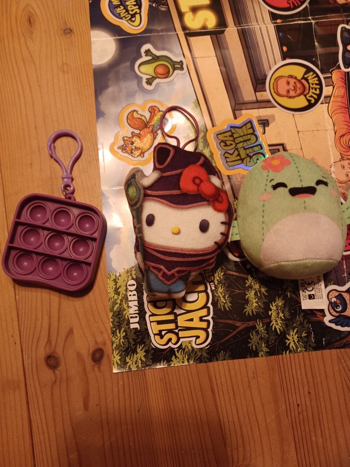 Leuke sleutelhangers: Pop-it, Hello Kitty en Squishmallow, Paars, Overige typen, Ophalen of Verzenden, Zo goed als nieuw