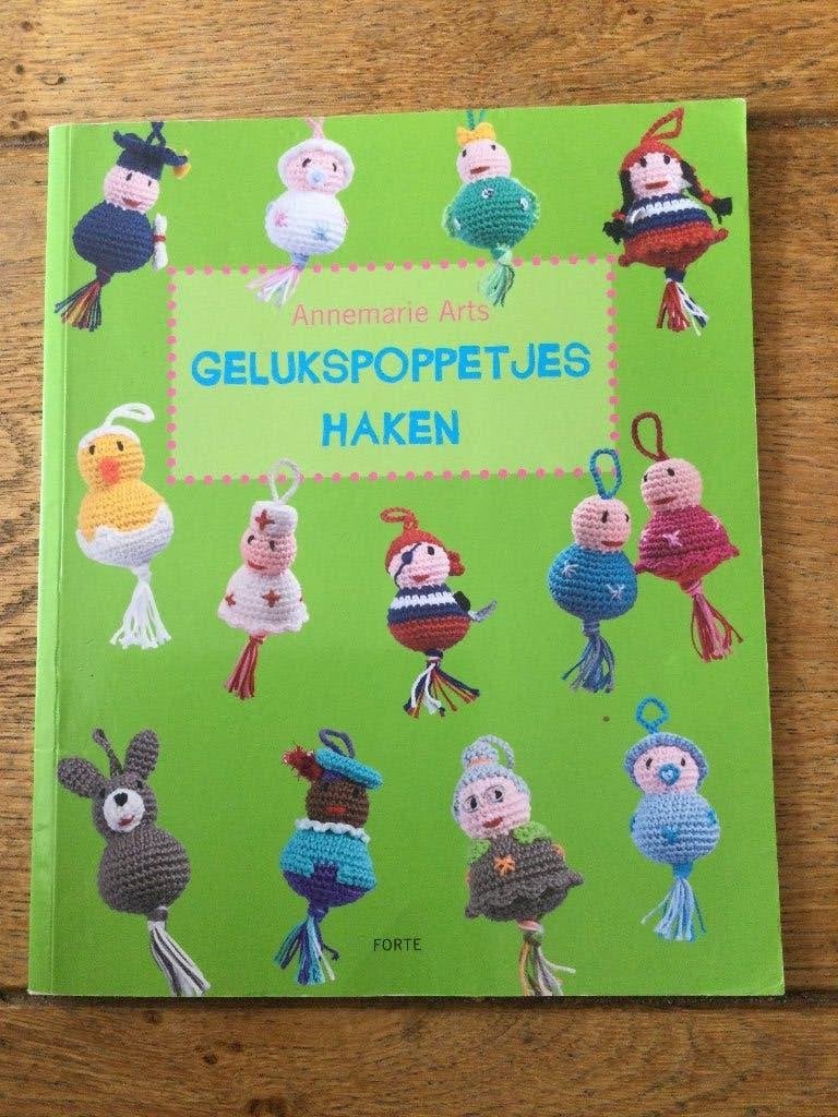 Annemarie Arts - Gelukspoppetjes haken, Ophalen of Verzenden, Zo goed als nieuw, Haken, Patroon of Boek