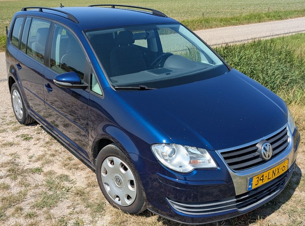 Volkswagen Touran 1.4 TSI 103KW Comfortline 2010 Trekhaak, Auto's, Volkswagen, Voorwielaandrijving, Stof, Zwart, 4 cilinders