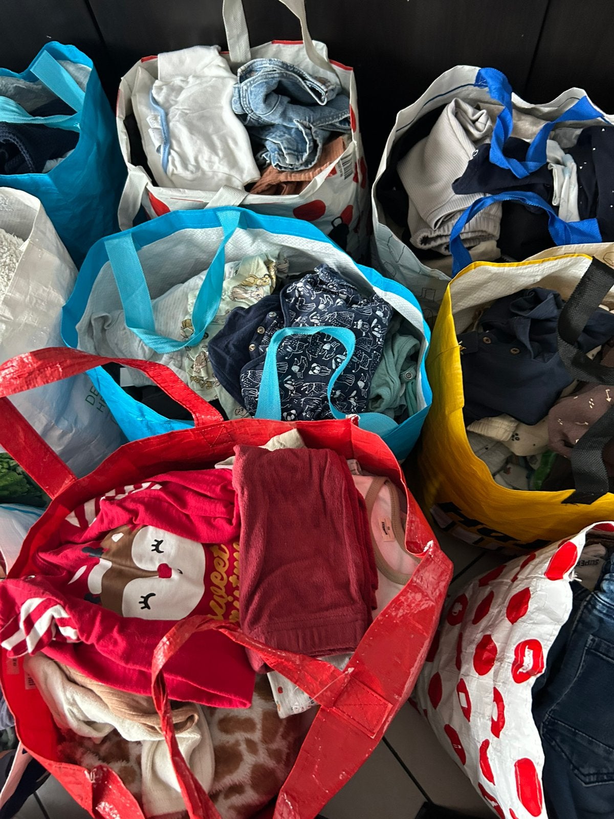 16 tassen met jongens babykleding tot maat 86, Ophalen, Zo goed als nieuw, Maat 86