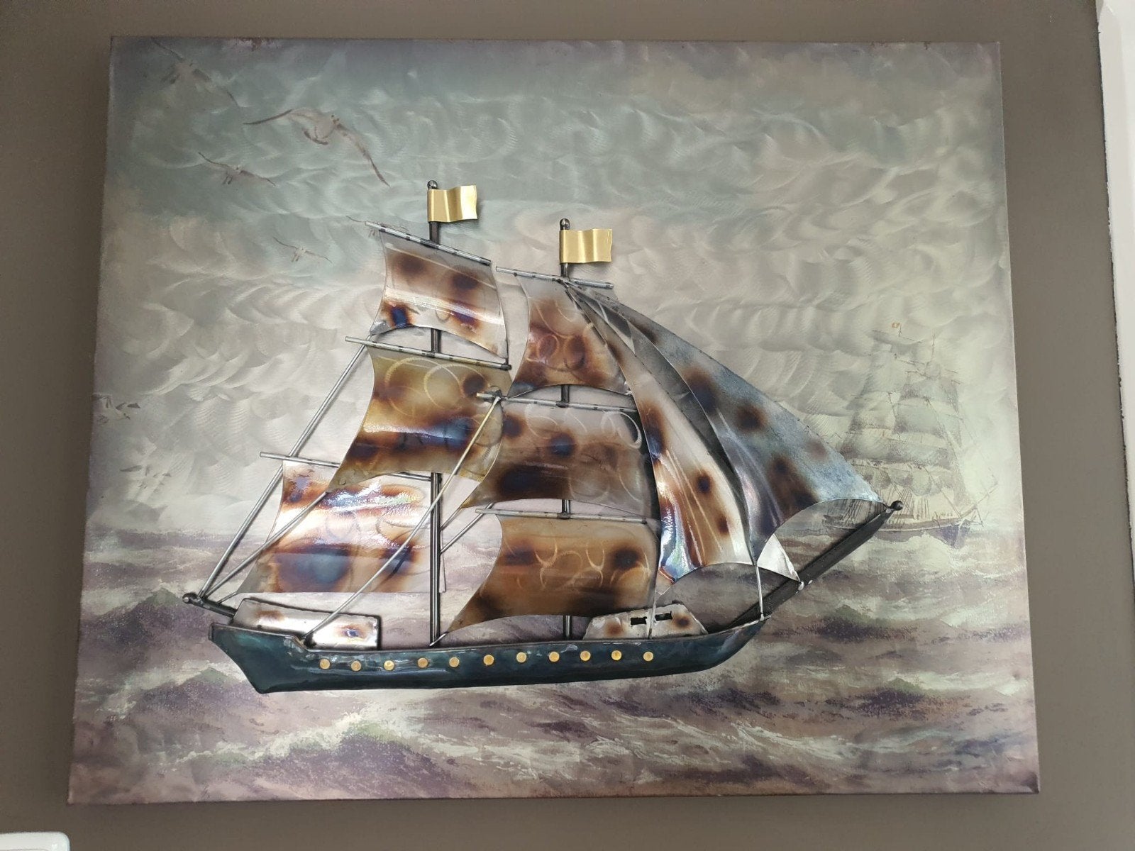 Metalen boot schilderij, Ophalen