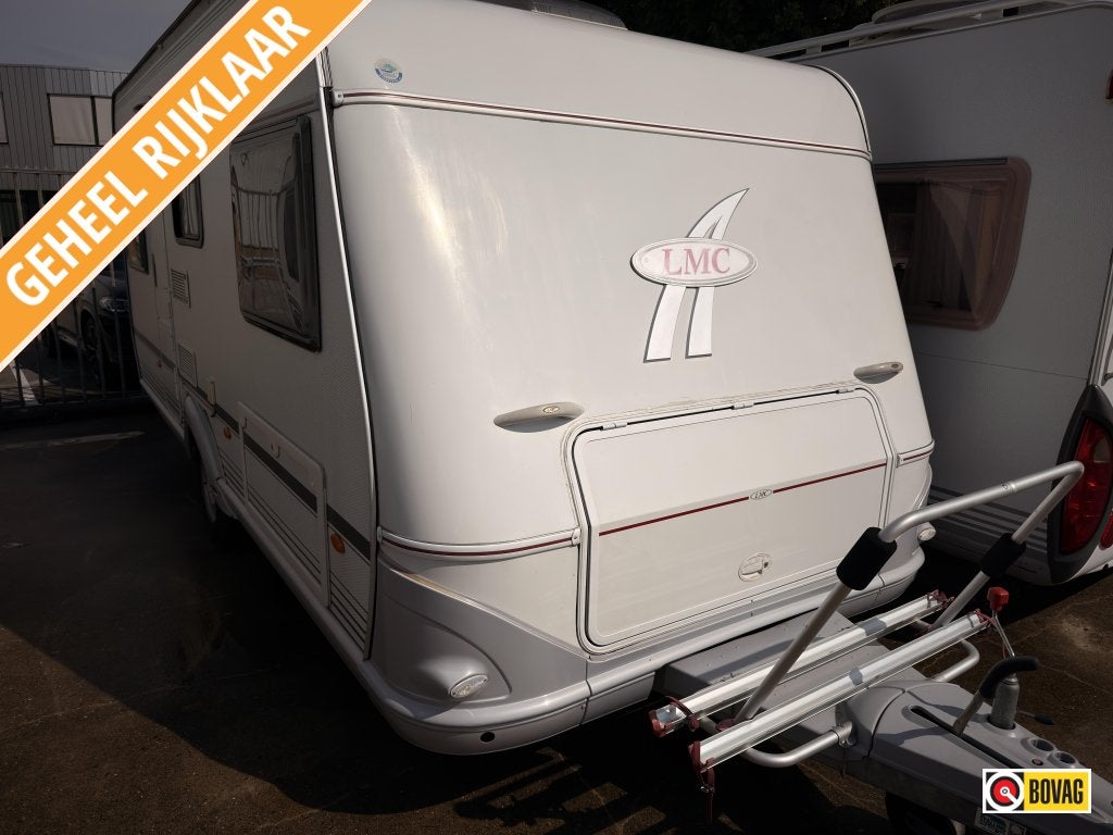 LMC Munsterland 490 P +mover, fietsrek, voorten, Caravans en Kamperen, Schokbreker, Rondzit, Bedrijf, 4 tot 5 meter