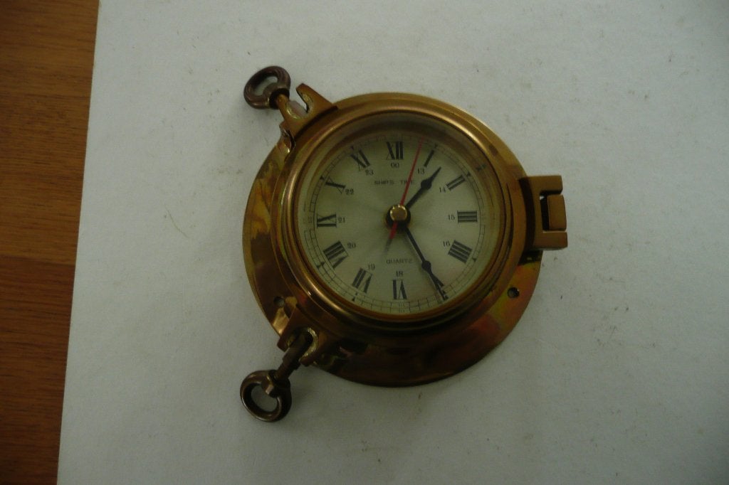 Messingkleurige scheepsklok (model patrijspoort), Ophalen of Verzenden, Zo goed als nieuw