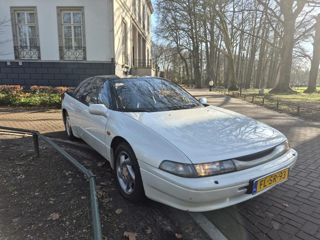 Unieke Subaru SVX 3.3 6 cilinder AUT 4WD 1992 - CULT auto, Auto's, Subaru, 1610 kg, Automatische klimaatregeling, Alcantara, Wit