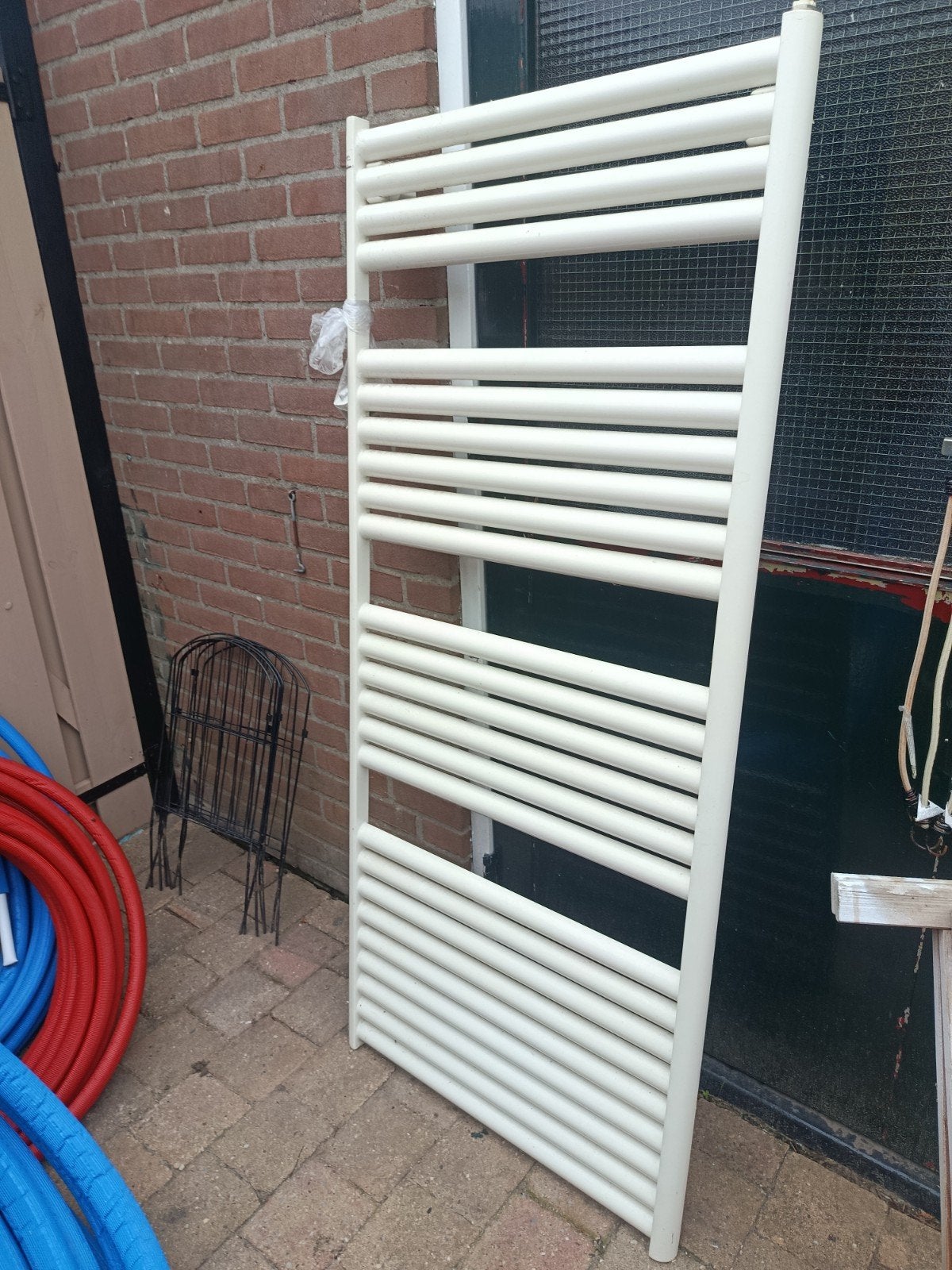 Witte handdoekradiator, Ophalen