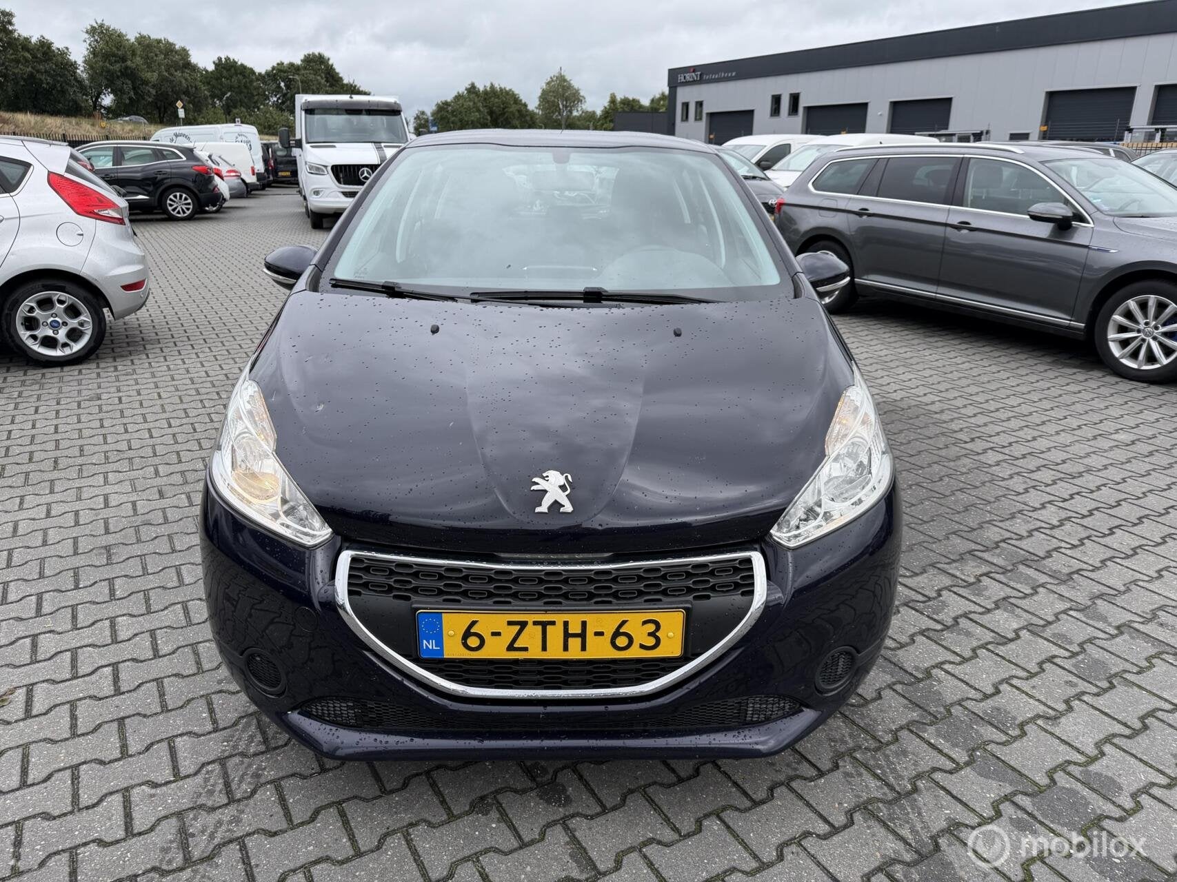 Peugeot 208 1.6 BlueHDi Blue Lease Premium, Auto's, Voorwielaandrijving, Gebruikt, 4 cilinders, Blauw