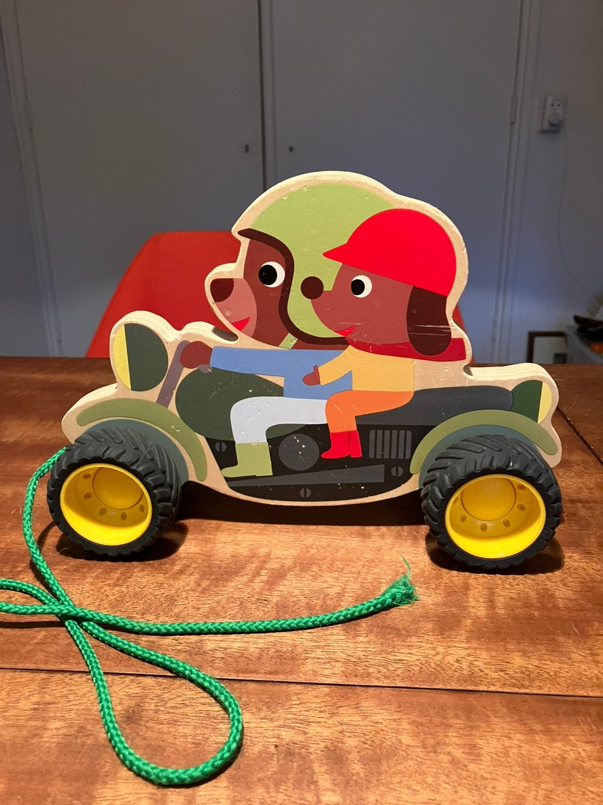 Djeco houten trekfiguur met rubber banden motor rijders, Ophalen of Verzenden