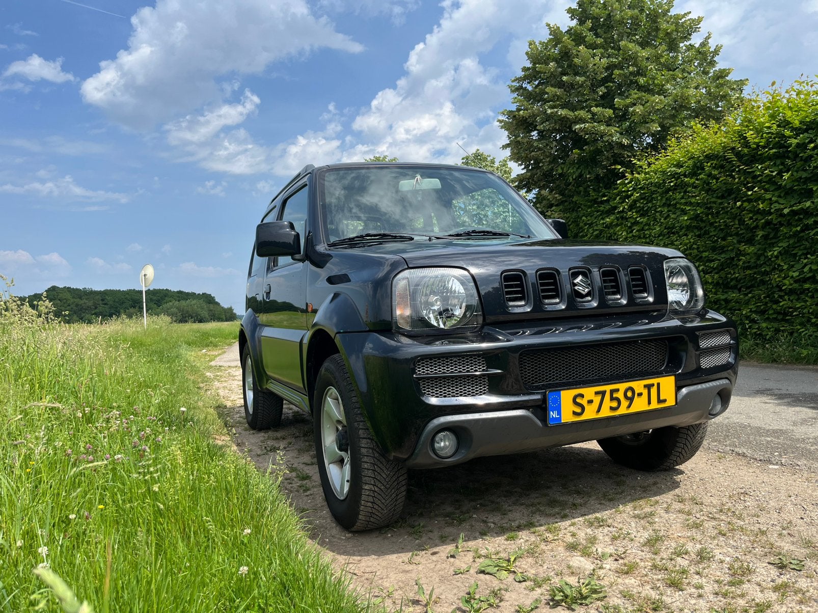 Suzuki Jimny 1.3 4WD | 129.000 km | Origineel, Auto's, Suzuki, 40 €/maand, 4 stoelen, Zwart, 14 km/l