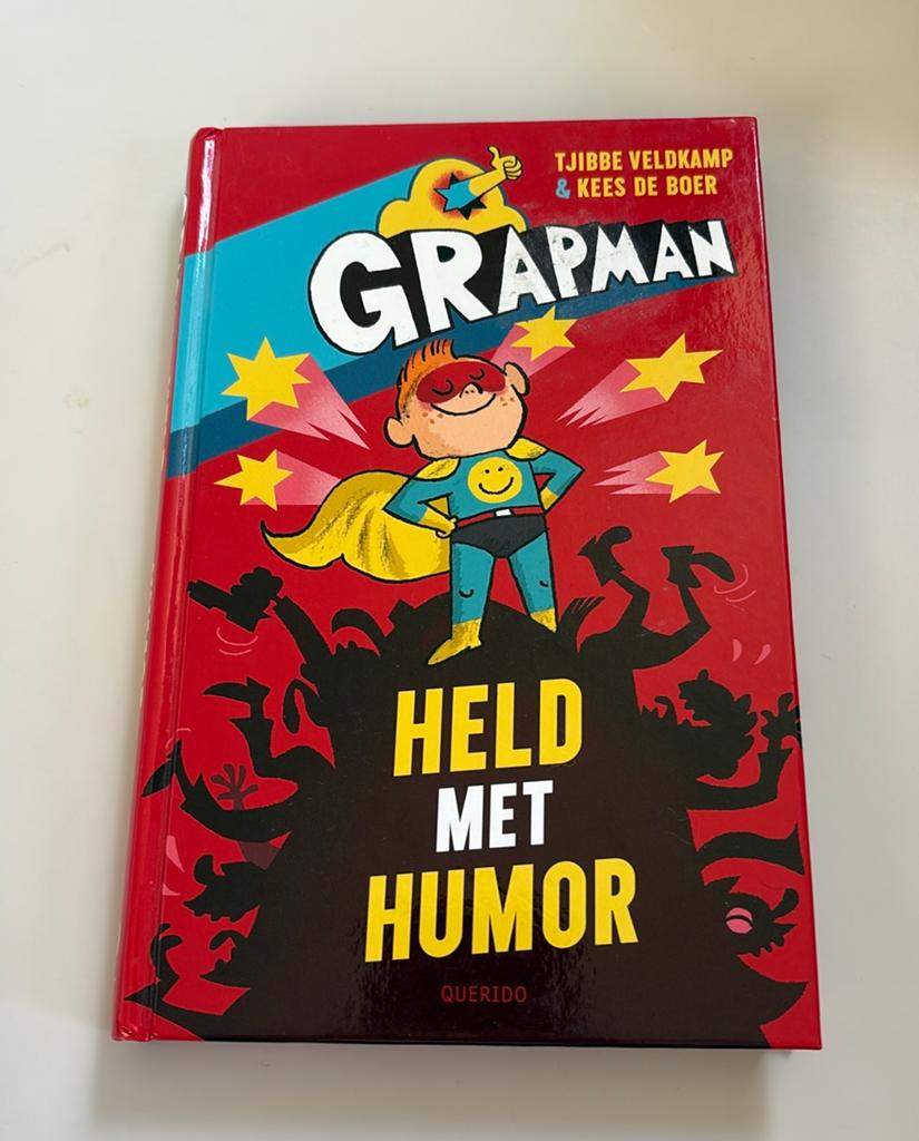 Grapman: Held met Humor, Boeken, Ophalen of Verzenden, Zo goed als nieuw, Fictie algemeen