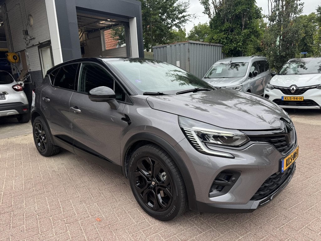 Renault Captur 1.6 E-Tech plug-in hybrid 160 SL Rive Gauche, Auto's, Renault, Gebruikt, Leder en Stof, Plug-in hybride, Bedrijf