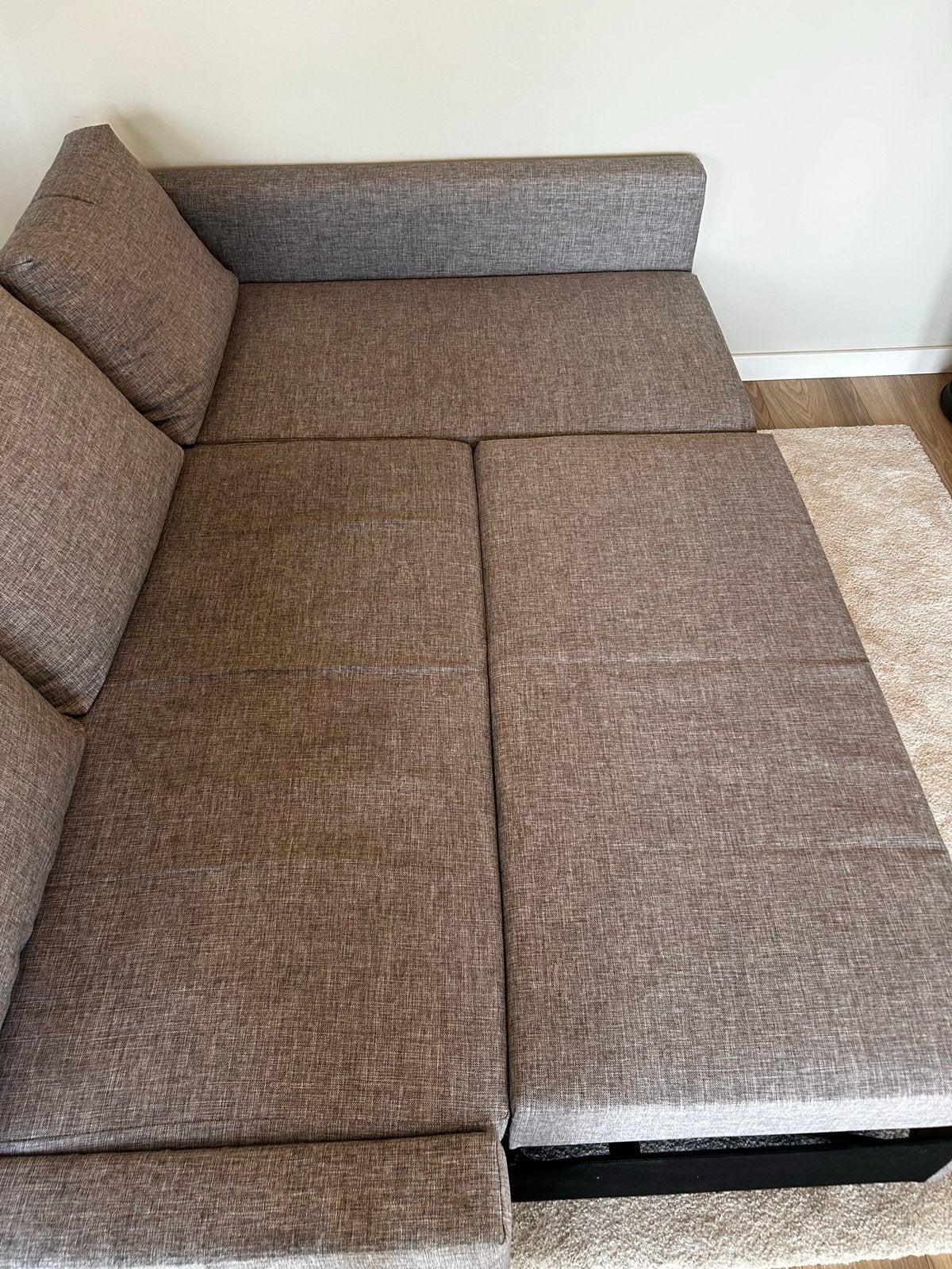 Foto 3 van Ikea grijze hoekbank/sofabed met opbergruimte