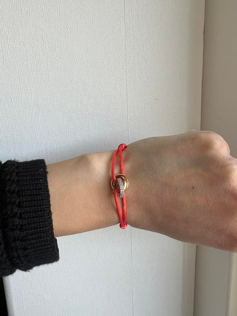 Cartier trinity oranje armband nieuw verstelbaar, Sieraden, Tassen en Uiterlijk, Ophalen of Verzenden, Zo goed als nieuw, Oranje