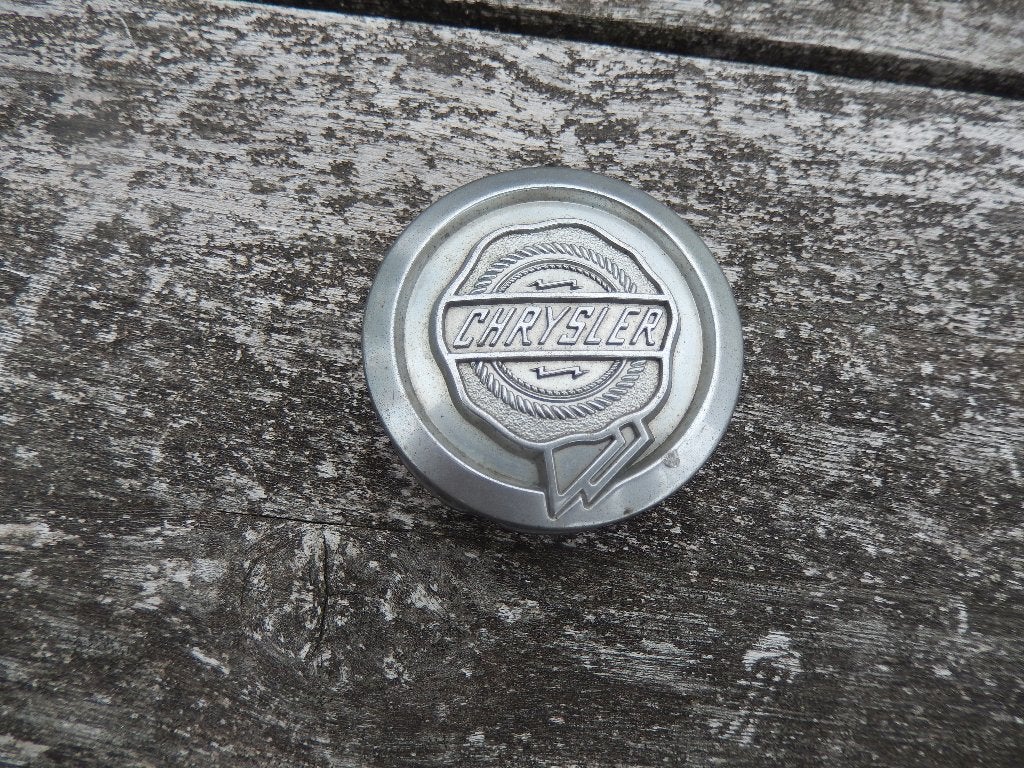 Chrysler wielnaafdop bandenafdekking logo badge, Auto diversen, Wieldoppen, Ophalen of Verzenden, Zo goed als nieuw