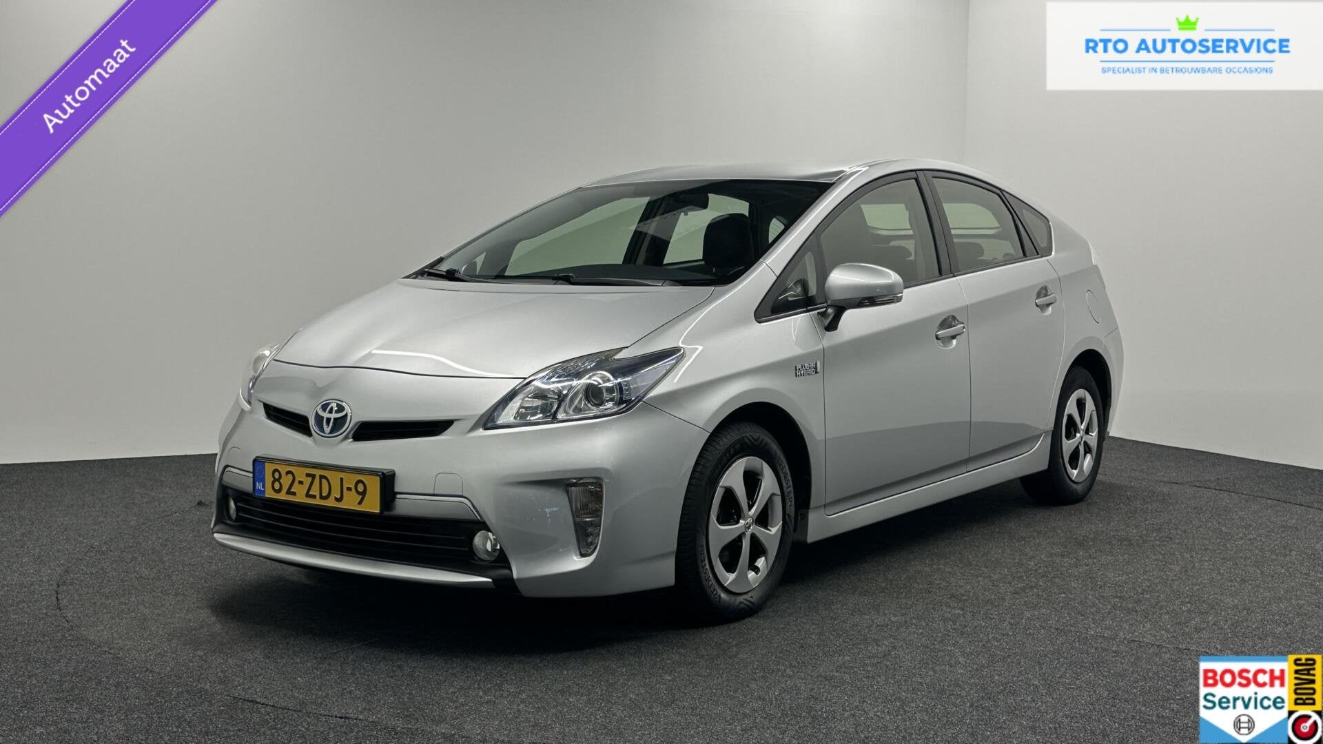 Toyota Prius 1.8 Plug-in Aspiration LEER NAVI CAMERA CRUISE., Auto's, Euro 5, 136 pk, Gebruikt, Zwart