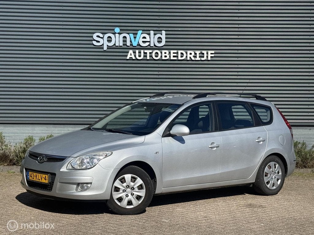 Hyundai i30 CW 1.6i Dynamic - Navi - Trekhaak - Parksensor -, Auto's, Voorwielaandrijving, Gebruikt, 1591 cc, Origineel Nederlands