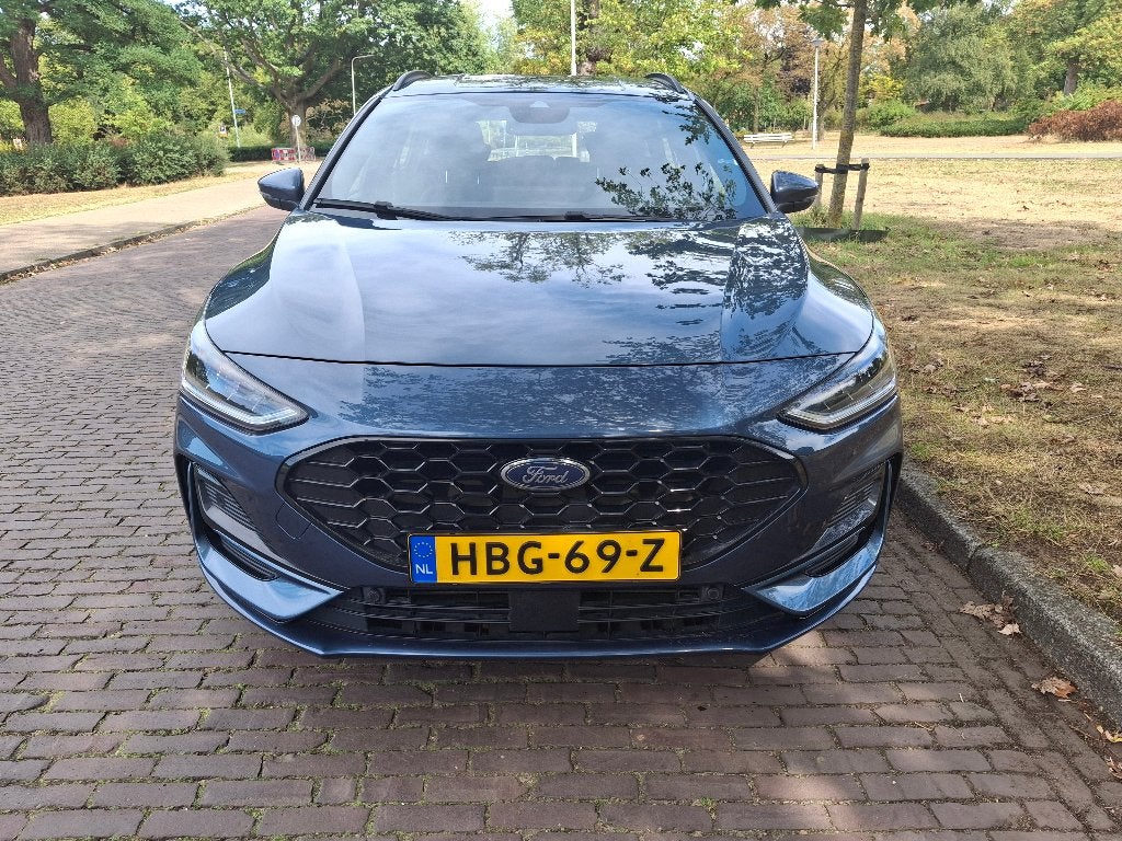 Ford Focus Wagon 1.0 Ecoboost Hybrid ST Line Blauw, Auto's, Ford, Zwart, 1404 kg, Blauw, Leder en Stof