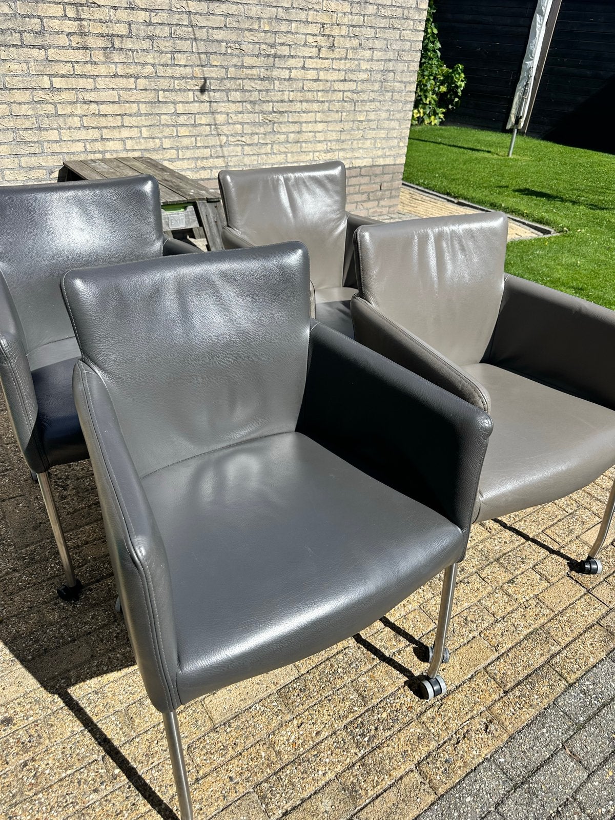 4 Leren eetkamerstoelen (grijs - antraciet met wieltjes, Gebruikt, Leer, Ophalen of Verzenden, Vier