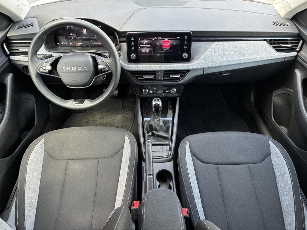 Skoda Scala DSG 7 TSI Selection / Fabrieksgarantie t/m 6-202, Auto's, Skoda, Euro 6, 610 kg, Wit, 3 cilinders