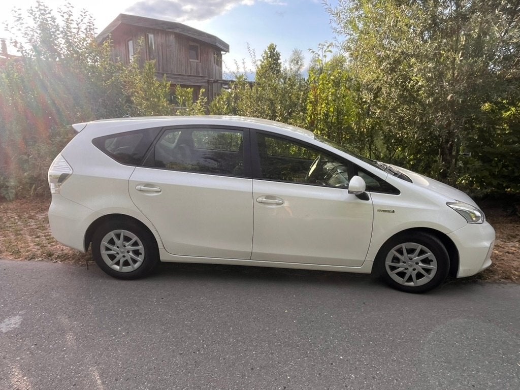 Toyota Prius Wagon 1.8 Full Hybrid 136PK Aut 95g 2013 Wit, Stof, 4 cilinders, 7 stoelen, Wit
