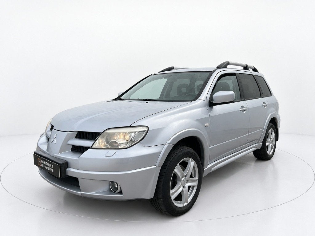 Mitsubishi OUTLANDER 2.4 SCOTT 4WD, Cruise, AUT, Trekhaak, Auto's, Automaat, 4 cilinders, Bedrijf, 161 pk