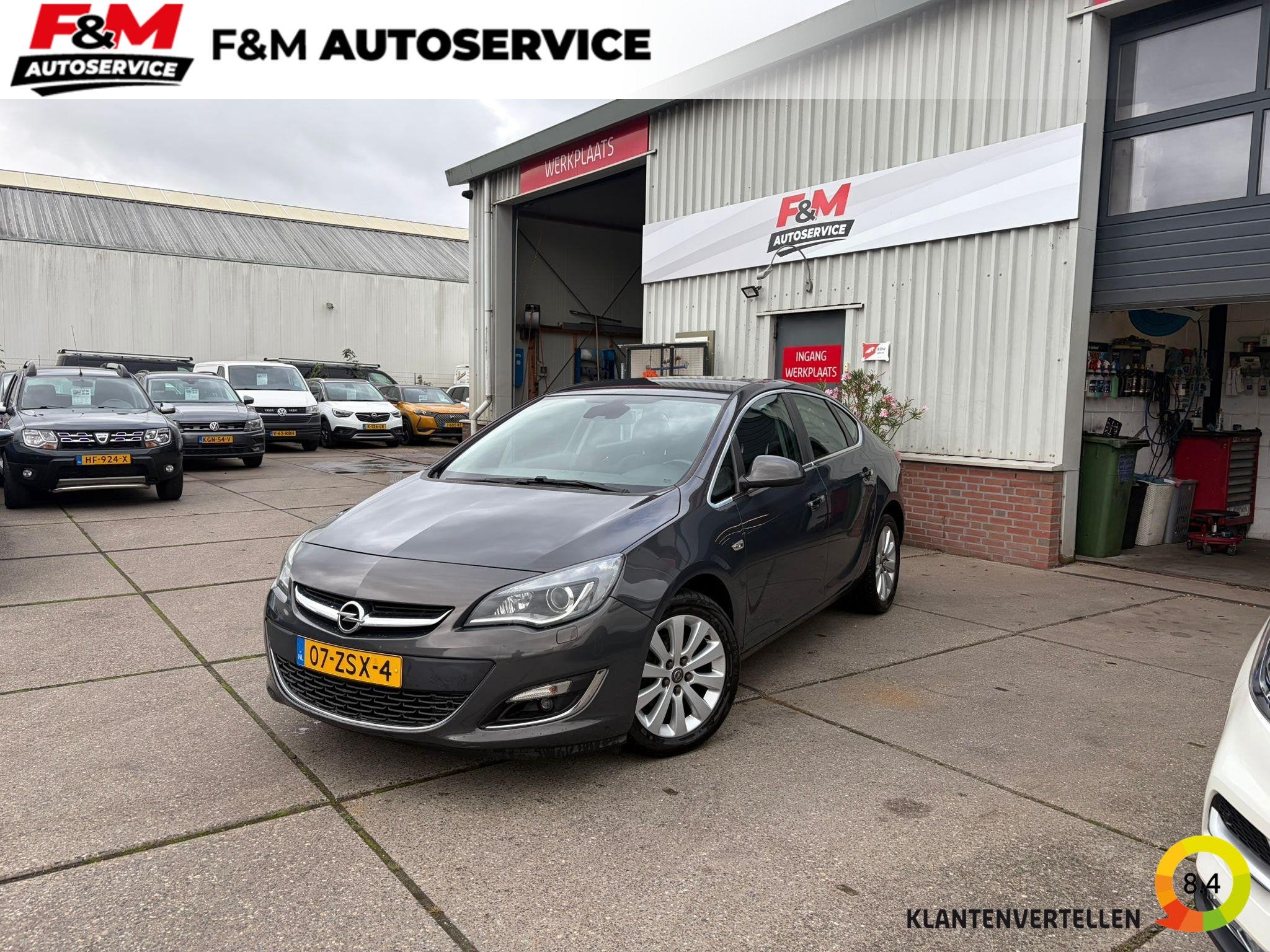Opel Astra 1.6 Turbo Cosmo Automaat, clima, cruise, navi, pd, Auto's, Euro 5, Stof, Gebruikt, Zwart