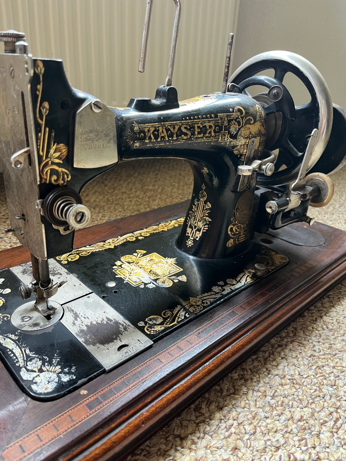 Kayser naaimachine, Ophalen
