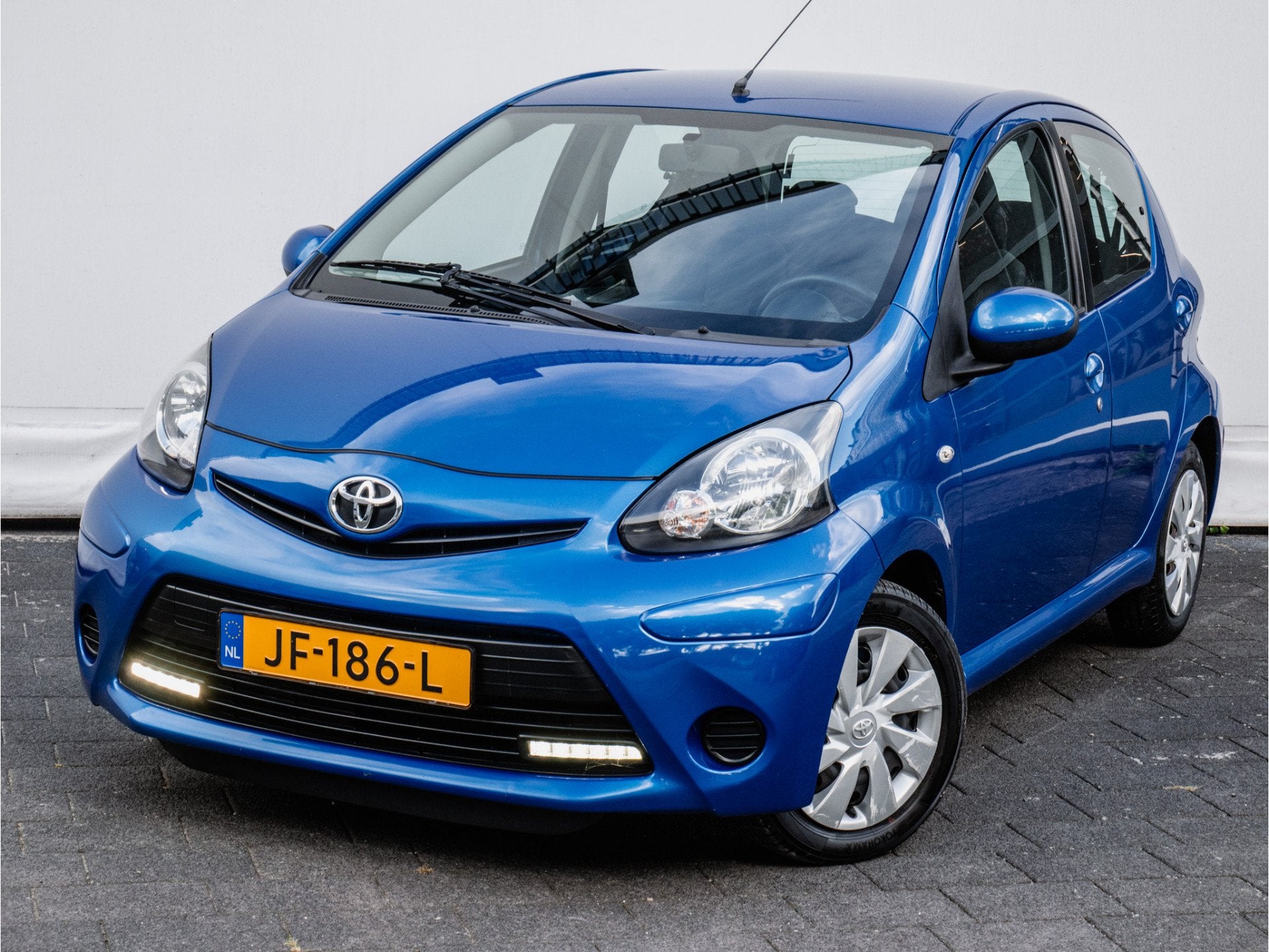Toyota Aygo 1.0 VVT-i Aut. Aspiration Elek. ramen/ Radio-cd, Auto's, Euro 5, Stof, Gebruikt, Zwart